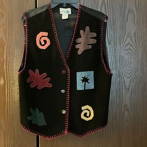 Paul Harris Design vintage 100% leather vest. Leather cutouts on the front. Med